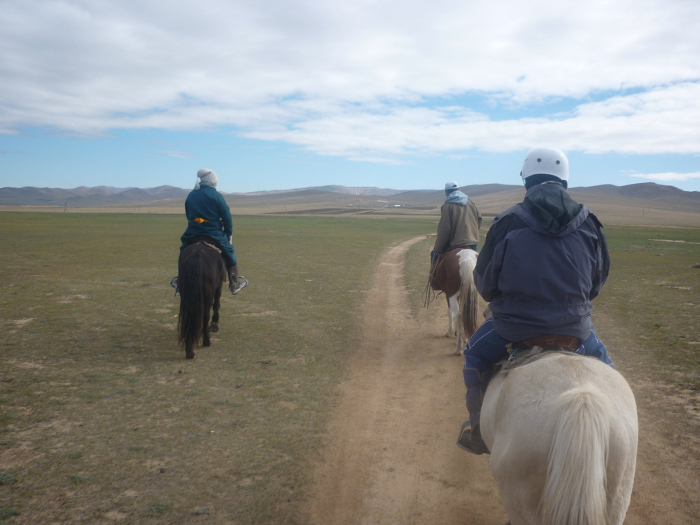 Horse riding in the Mongolian countryside